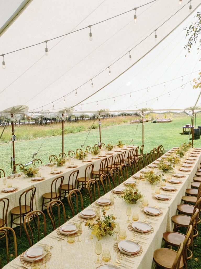 Long reception tables with florals