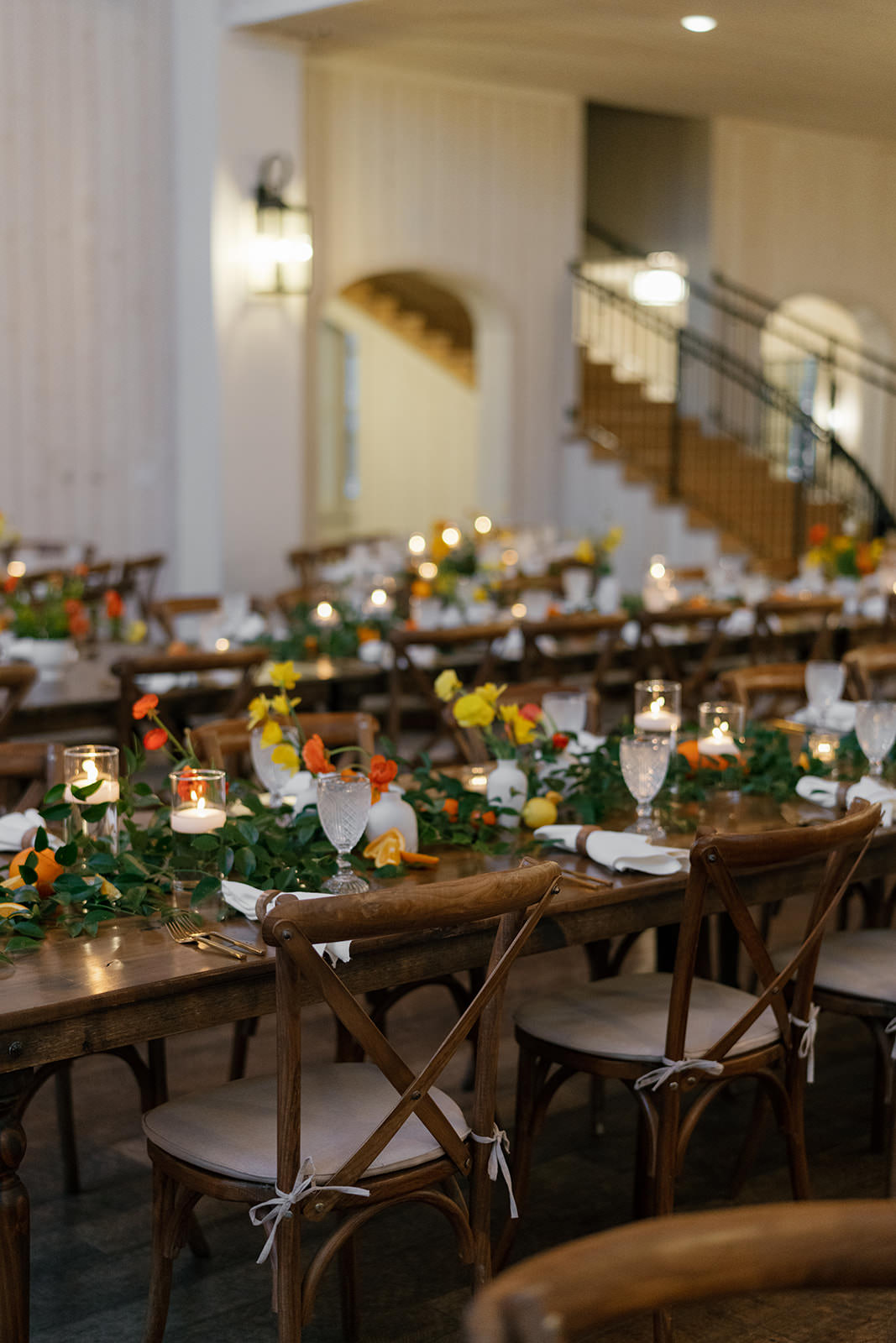 Wide shot of reception space with florals