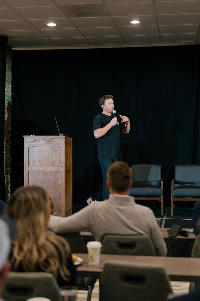 Speakers addressing audience