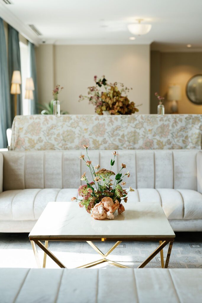 The couple and their guests enjoyed a sophisticated cocktail hour in the hotel's stylish lounge, where custom cocktails and elegant hors d'oeuvres set the tone for the evening's festivities. The space offered a perfect blend of relaxation and anticipation, allowing guests to mingle and celebrate before the formal reception.