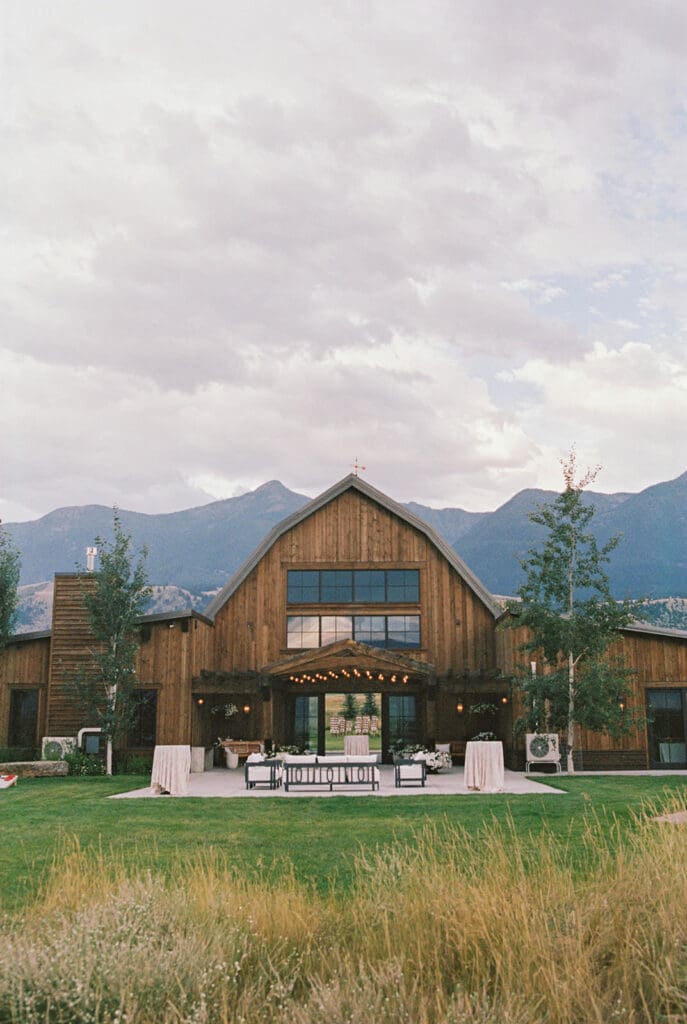 Copper Rose Ranch barn reception venue surrounded by Montana mountains