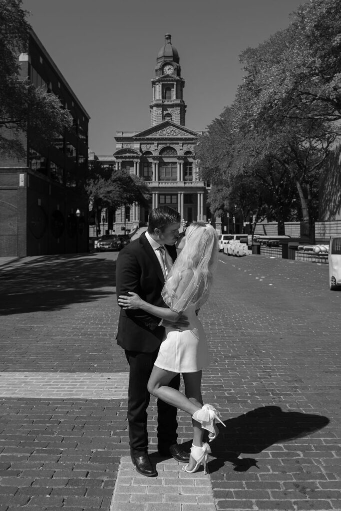Family celebrating after courthouse vows in downtown Fort Worth.