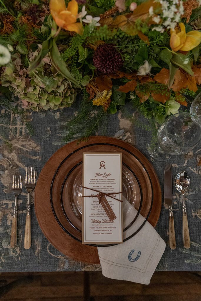 Custom leather menu cards by Hazelwood Paper Co. at Lonesome Dove dinner.