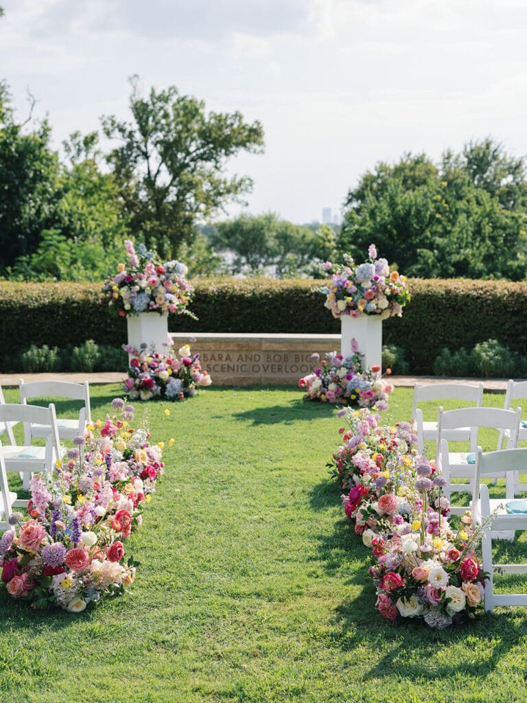 Floral-lined aisle for Dallas Arboretum garden ceremony