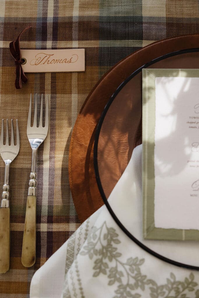 wood flatware on pattern linen western tablescape vibe